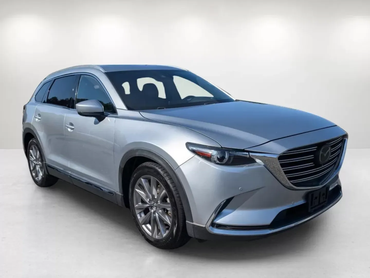 2021 /Black Mazda CX-9 Grand Touring (JM3TCADY4M0) with an Other engine, located at 7000 Northlake Connector, Columbus, GA, 31904, (706) 987-8085, 32.524975, -84.978134 - **Drive Your Family Adventures with Confidence - 2021 Mazda CX-9 Grand Touring at Gils Auto!**<br /> <br /> Are you ready to elevate your family's adventures? The 2021 Mazda CX-9 Grand Touring is the perfect SUV for those who thrive on creating unforgettable memories, whether it's a long weekend get - Photo#2